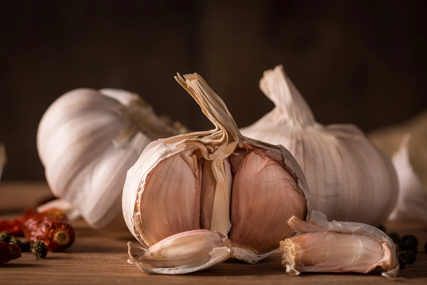 Choose garlic bulbs that feel firm in your palm while shopping; if they're too porous or creaky, you won't have an easy time peeling them.